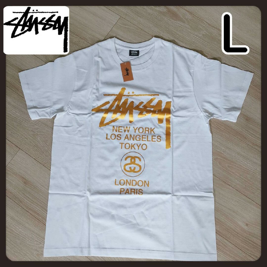 STUSSY(ステューシー)のステューシー Tシャツ 半袖 STUSSY メンズ ワールドツアーゴールドL メンズのトップス(Tシャツ/カットソー(半袖/袖なし))の商品写真