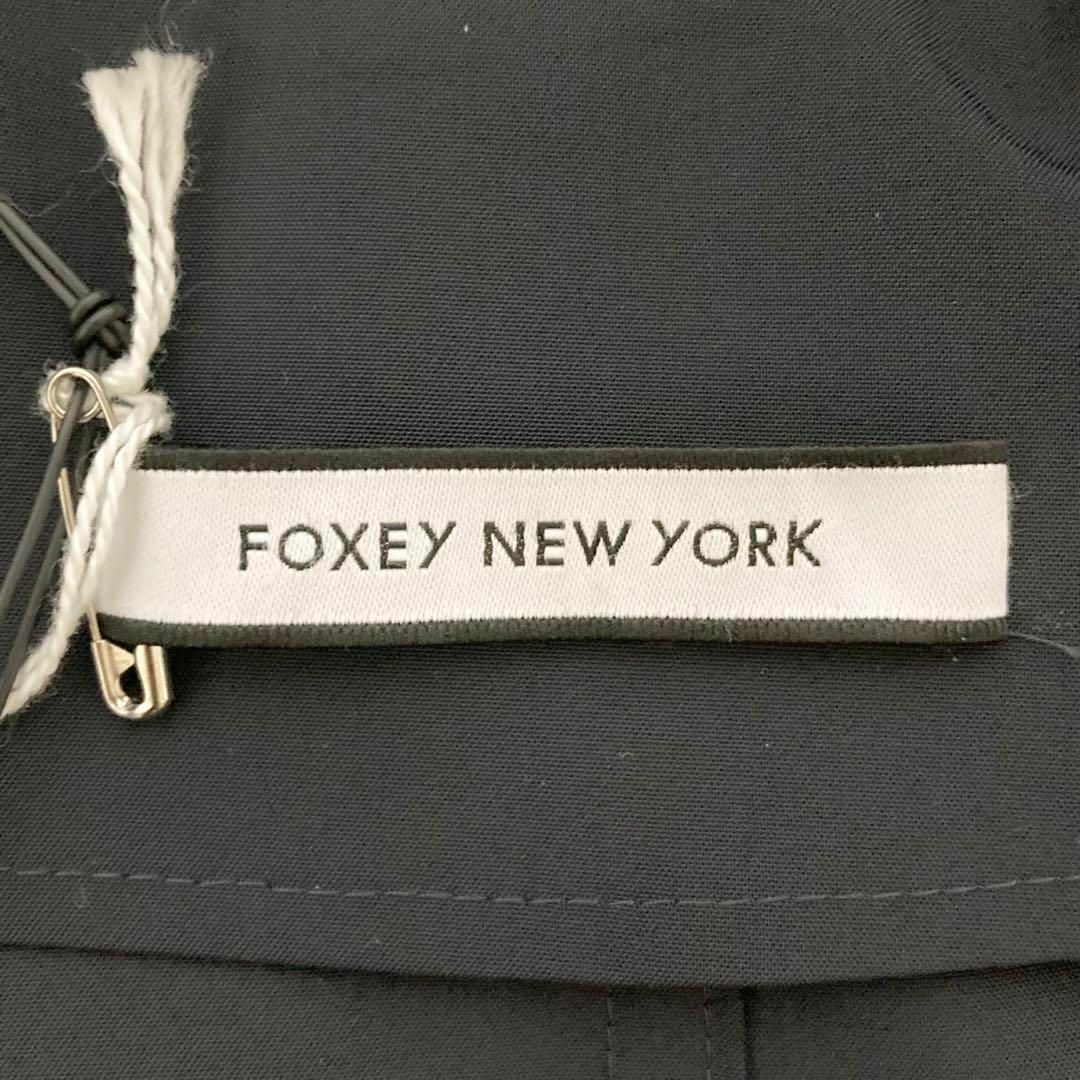 FOXEY NEW YORK(フォクシーニューヨーク)の美品　フォクシーニューヨーク　レイニーコート　ウォータープルーフ　38　紺 レディースのジャケット/アウター(スプリングコート)の商品写真