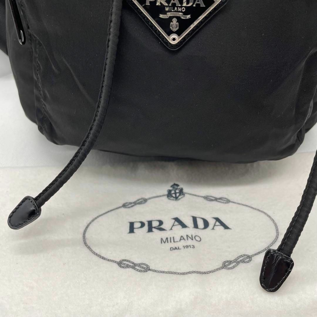 PRADA(プラダ)の62 美品　プラダ　バッグパック　リュック　巾着　ナイロン　白タグ　三角ロゴ レディースのバッグ(リュック/バックパック)の商品写真