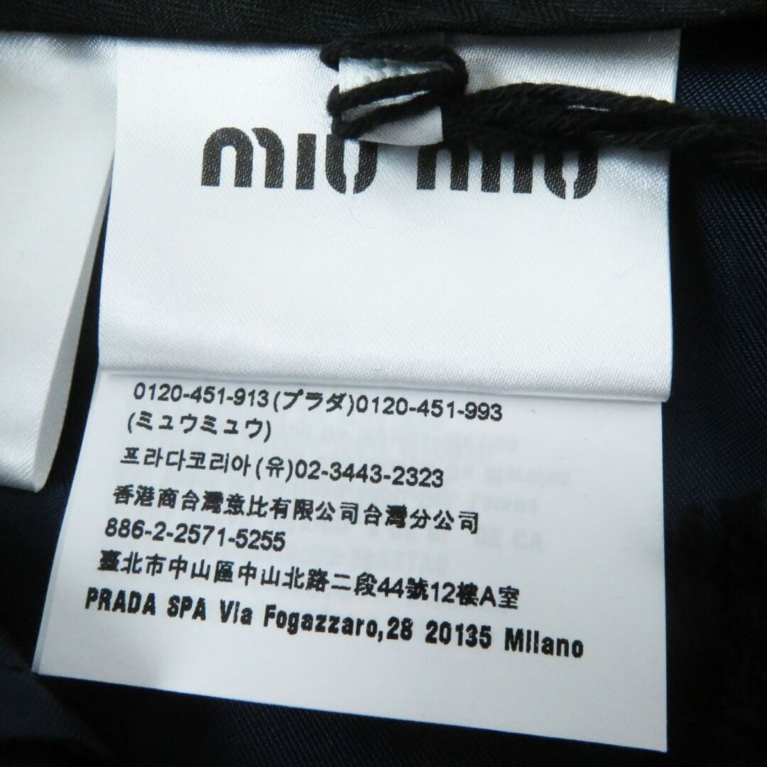 miumiu(ミュウミュウ)の未使用品◎正規品 2022年 MIUMIU ミュウミュウ MP1436 グラン ドゥ プードル ウール ショートパンツ 金ボタン ネイビー 36 タグ付き 伊製 レディースのパンツ(ショートパンツ)の商品写真
