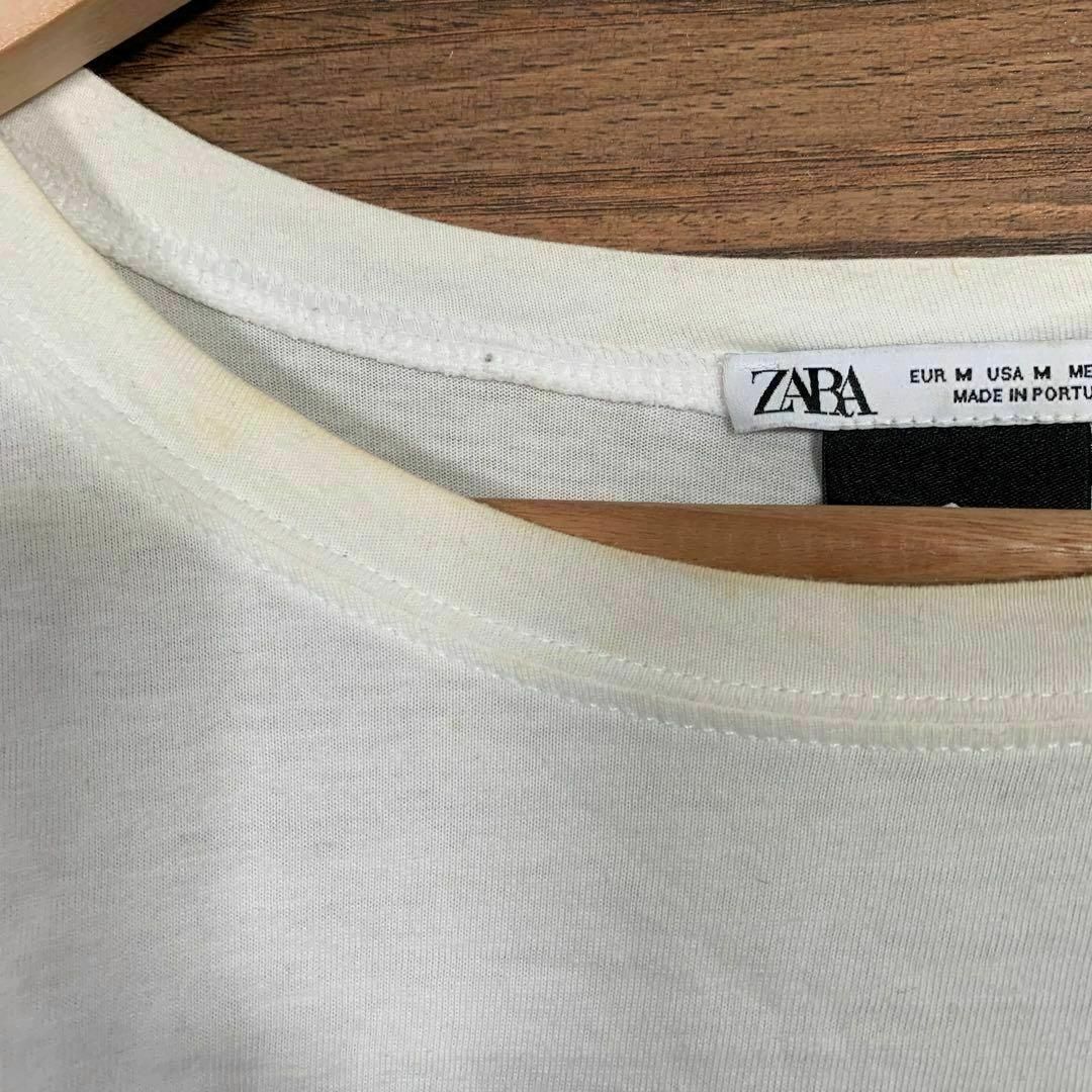 ZARA(ザラ)のZARA ザラ Tシャツ Mサイズ ディズニー ネバーランド 白 プリント レディースのトップス(Tシャツ(半袖/袖なし))の商品写真