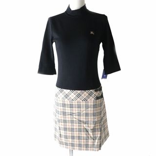 バーバリーブルーレーベル(BURBERRY BLUE LABEL)の未使用★正規品 バーバリーブルーレーベル FMF81-633 ロゴ刺繍入 レザー使い ハイネック 五分袖 ワンピース 黒×ベージュ 38 日本製 タグ付(ミニワンピース)