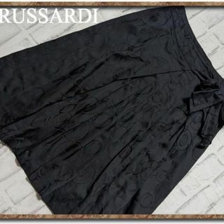 トラサルディ(Trussardi)のトラサルディ　リボン付きコットンスカート　黒(ひざ丈スカート)