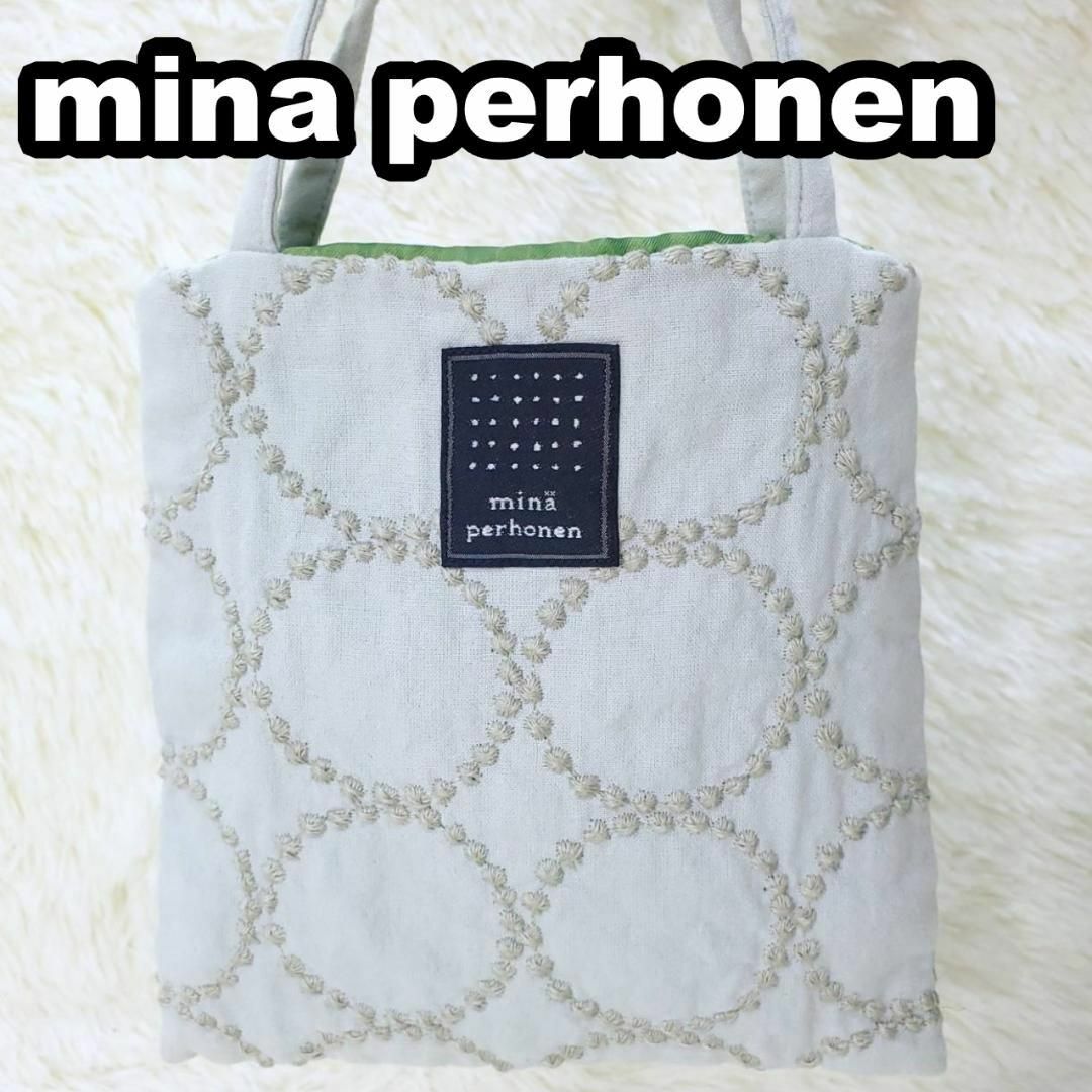 mina perhonen(ミナペルホネン)のミナペルホネン　ハンドバッグ　ブルー　タンバリン　刺繍　ミニバッグ レディースのバッグ(ハンドバッグ)の商品写真