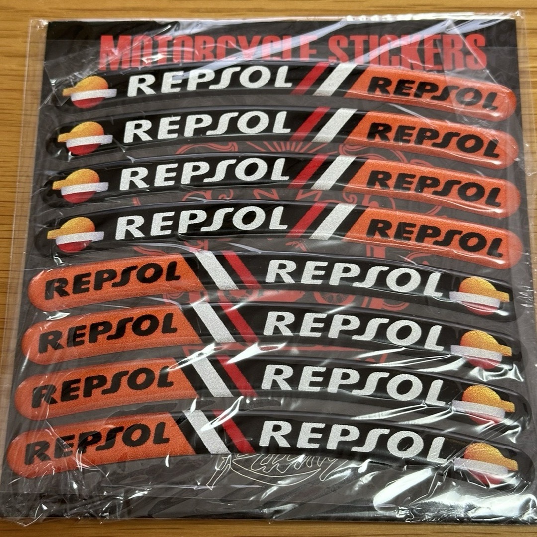 【新品】レプソル REPSOL 立体樹脂リムステッカー 自動車/バイクのバイク(ステッカー)の商品写真