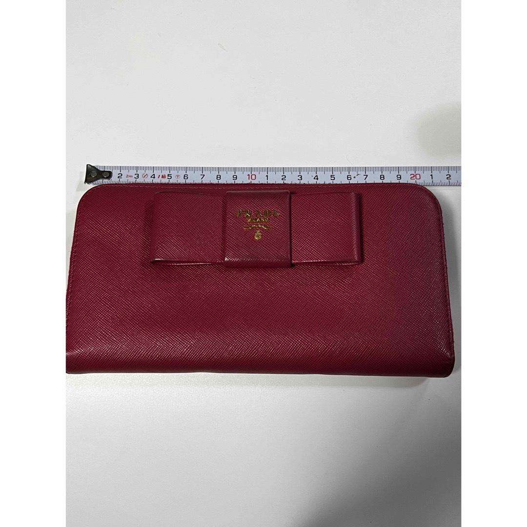 PRADA(プラダ)のプラダ　長財布　リボン　サフィアーノ　濃いピンク系 レディースのファッション小物(財布)の商品写真