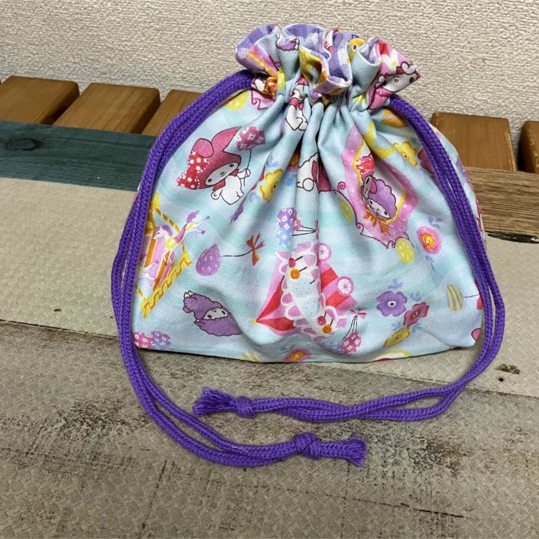 サンリオ(サンリオ)の新品 未使用 ハンドメイド マイメロ 女の子 紫 巾着袋 お弁当袋 ハンドメイドのキッズ/ベビー(外出用品)の商品写真