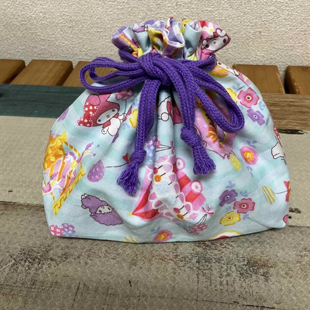 サンリオ(サンリオ)の新品 未使用 ハンドメイド マイメロ 女の子 紫 巾着袋 お弁当袋 ハンドメイドのキッズ/ベビー(外出用品)の商品写真