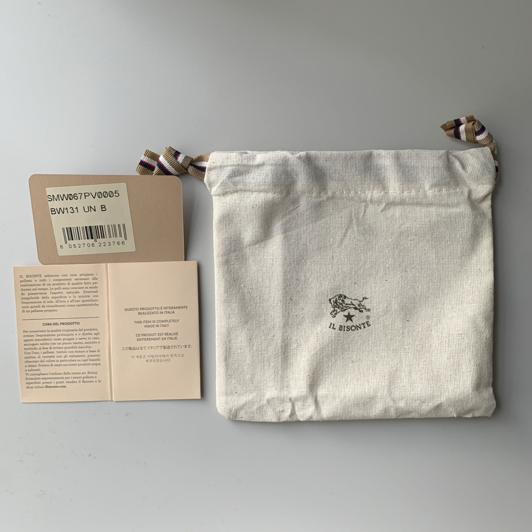 IL BISONTE(イルビゾンテ)の【新品】イルビゾンテ 二つ折り財布 ラウンドジップ ダークブラウン マロン レディースのファッション小物(財布)の商品写真
