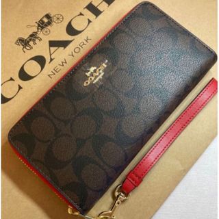 コーチ(COACH)の新品　コーチ　長財布　レッド　シグネチャー　ラウンドファスナー　小銭入れ有(財布)