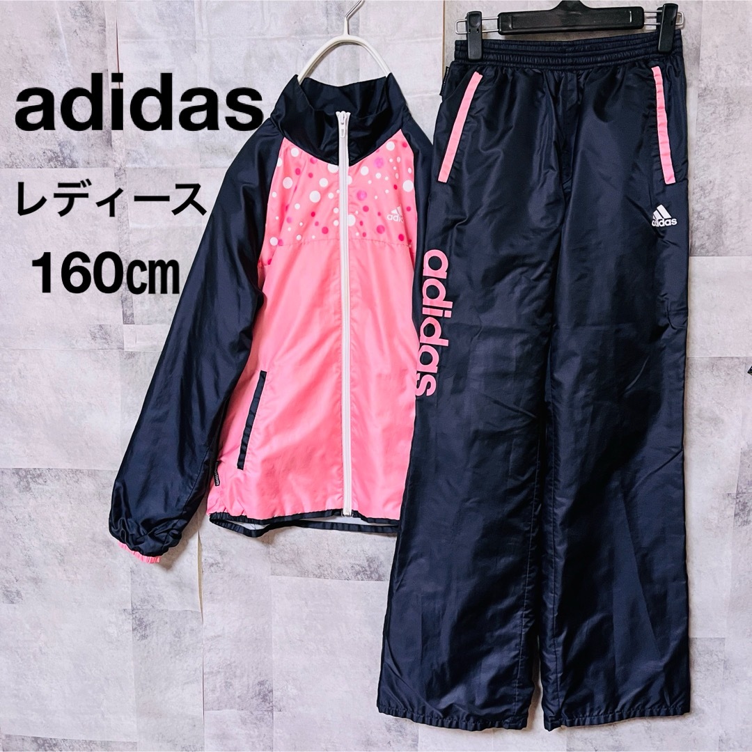 adidas(アディダス)のアディダスウインドブレーカー上下セット160㎝　レディース　ブラック×ピンク キッズ/ベビー/マタニティのキッズ服女の子用(90cm~)(ジャケット/上着)の商品写真