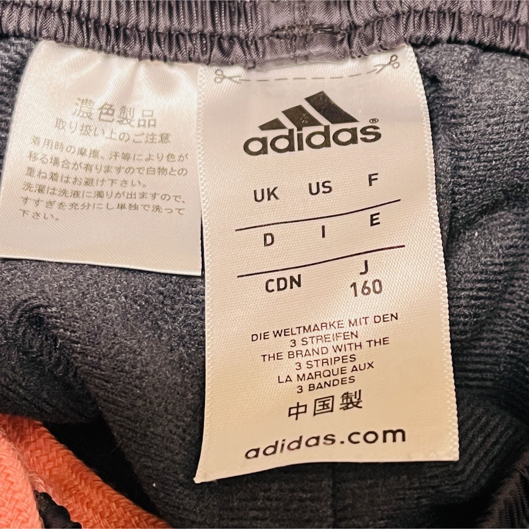 adidas(アディダス)のアディダスウインドブレーカー上下セット160㎝　レディース　ブラック×ピンク キッズ/ベビー/マタニティのキッズ服女の子用(90cm~)(ジャケット/上着)の商品写真