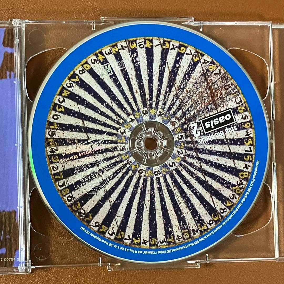 オアシス / Stop The Clock 【2枚組ベストアルバム】 エンタメ/ホビーのCD(ポップス/ロック(洋楽))の商品写真