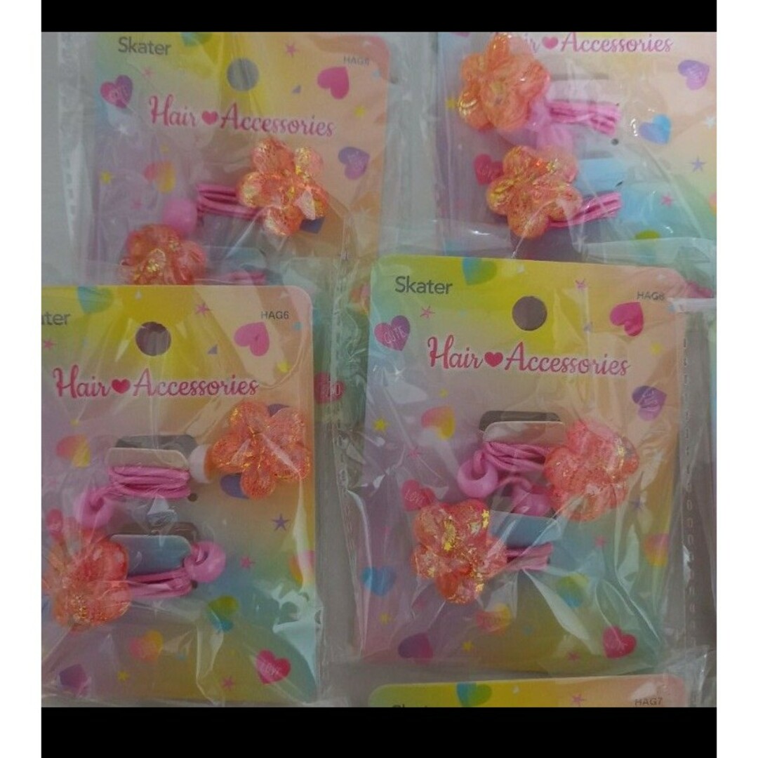 いちごヘアゴム　お花ヘアゴム　10袋 レディースのヘアアクセサリー(ヘアゴム/シュシュ)の商品写真