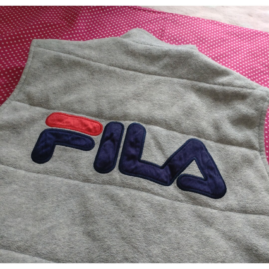 FILA リバーシブル ベスト珍品＜税送料1800円込み＞フィラ古着 タウン ベ メンズのトップス(ベスト)の商品写真