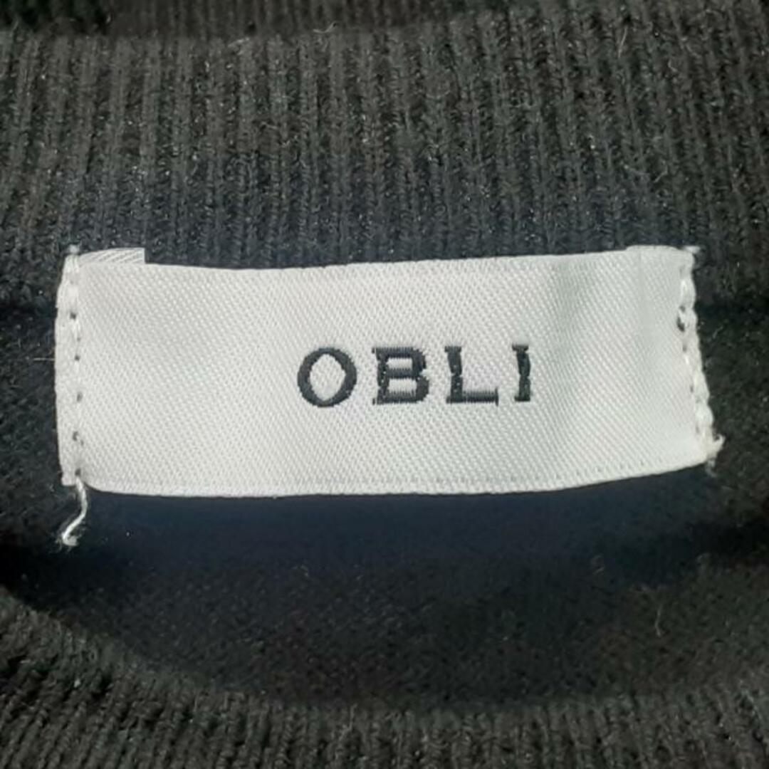 OBLI(オブリ)のOBLI(オブリ) ワンピース サイズ0 XS レディース美品  - 黒×白 長袖/ひざ丈/ニット/異素材切替/ドット柄 レディースのワンピース(その他)の商品写真