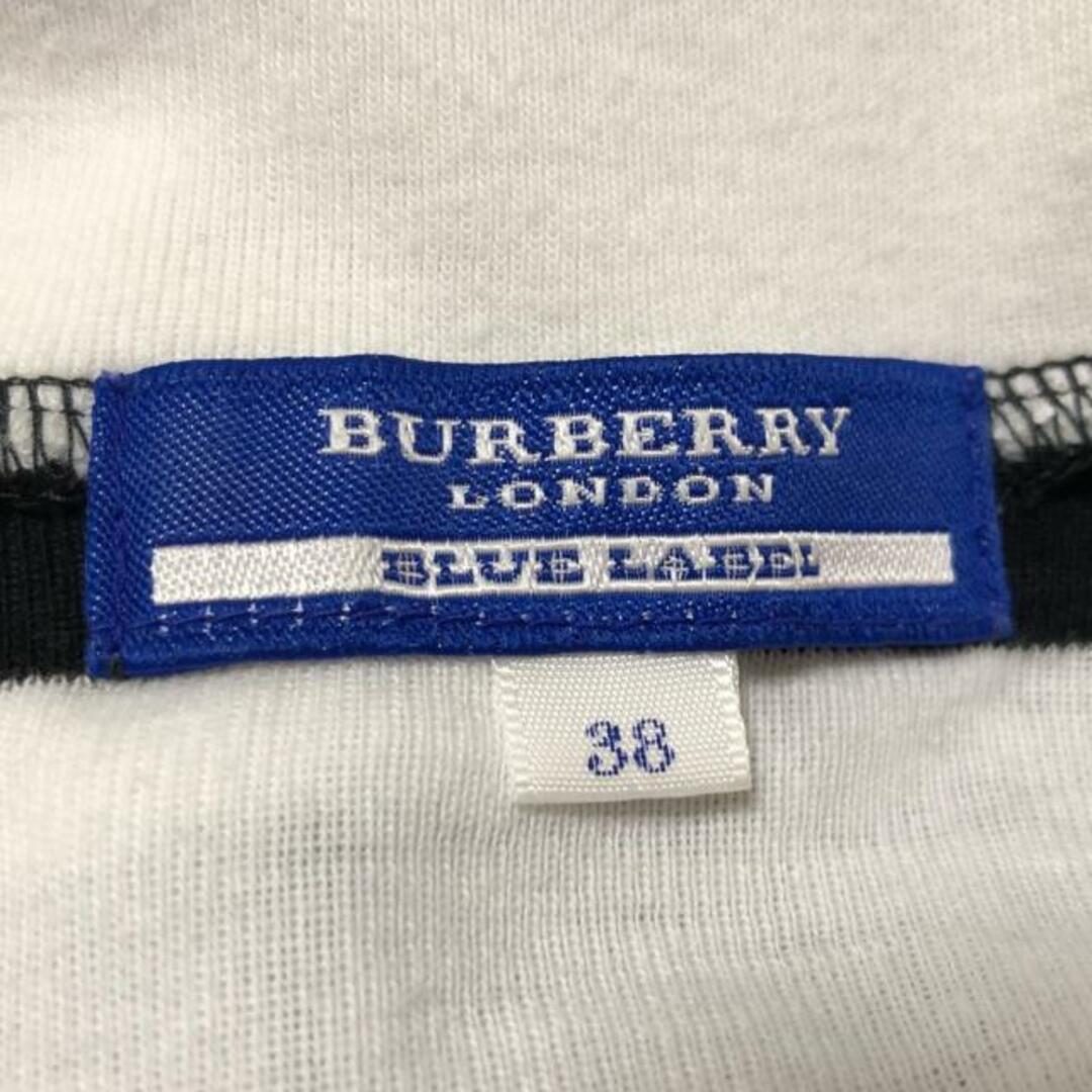 BURBERRY BLUE LABEL(バーバリーブルーレーベル)のBurberry Blue Label(バーバリーブルーレーベル) カーディガン サイズ38 M レディース - 白×黒 長袖/ボーダー レディースのトップス(カーディガン)の商品写真