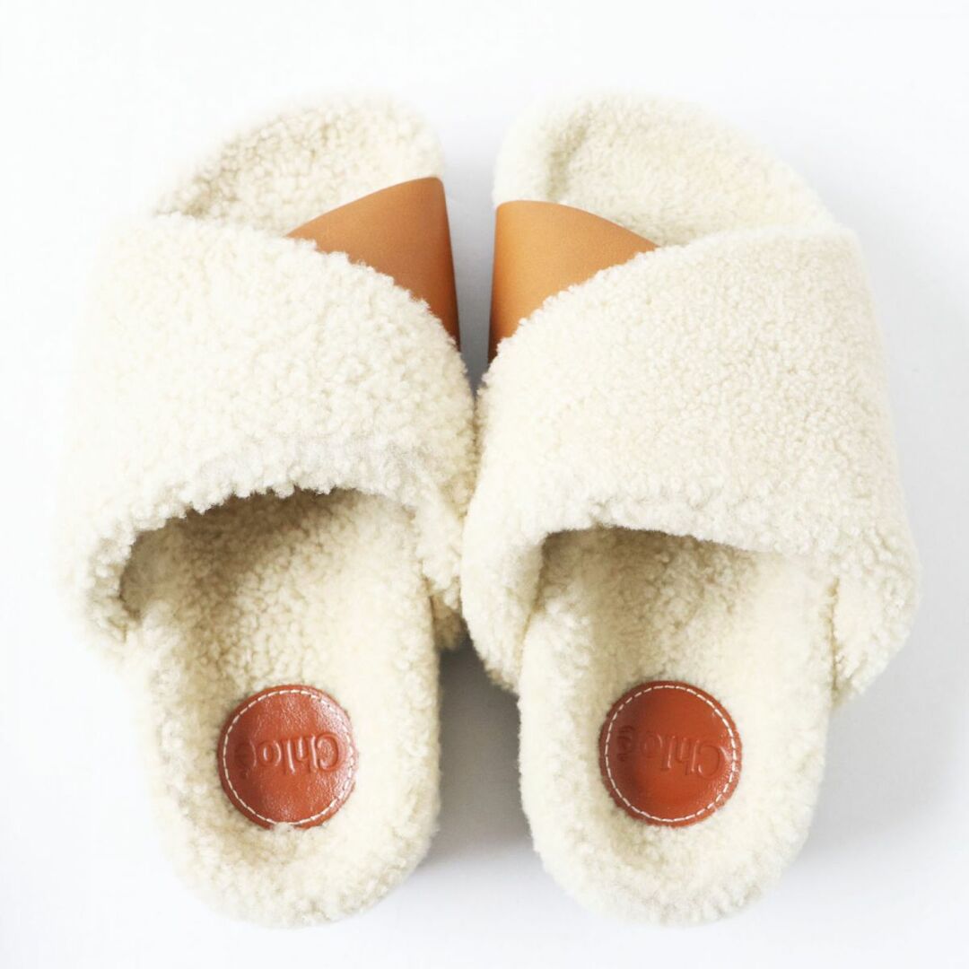 Chloe(クロエ)の未使用品◎正規品 定価89100円 Chloe クロエ WAVY SLIDES レディース ムートンレザー フラットサンダル ブラウン×ベージュ 35 箱・袋付き レディースの靴/シューズ(サンダル)の商品写真