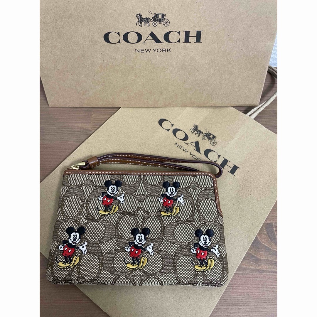 COACH(コーチ)のコーチ COACH ポーチ ディズニー コラボ シグネチャー ミッキーマウス レディースのファッション小物(ポーチ)の商品写真