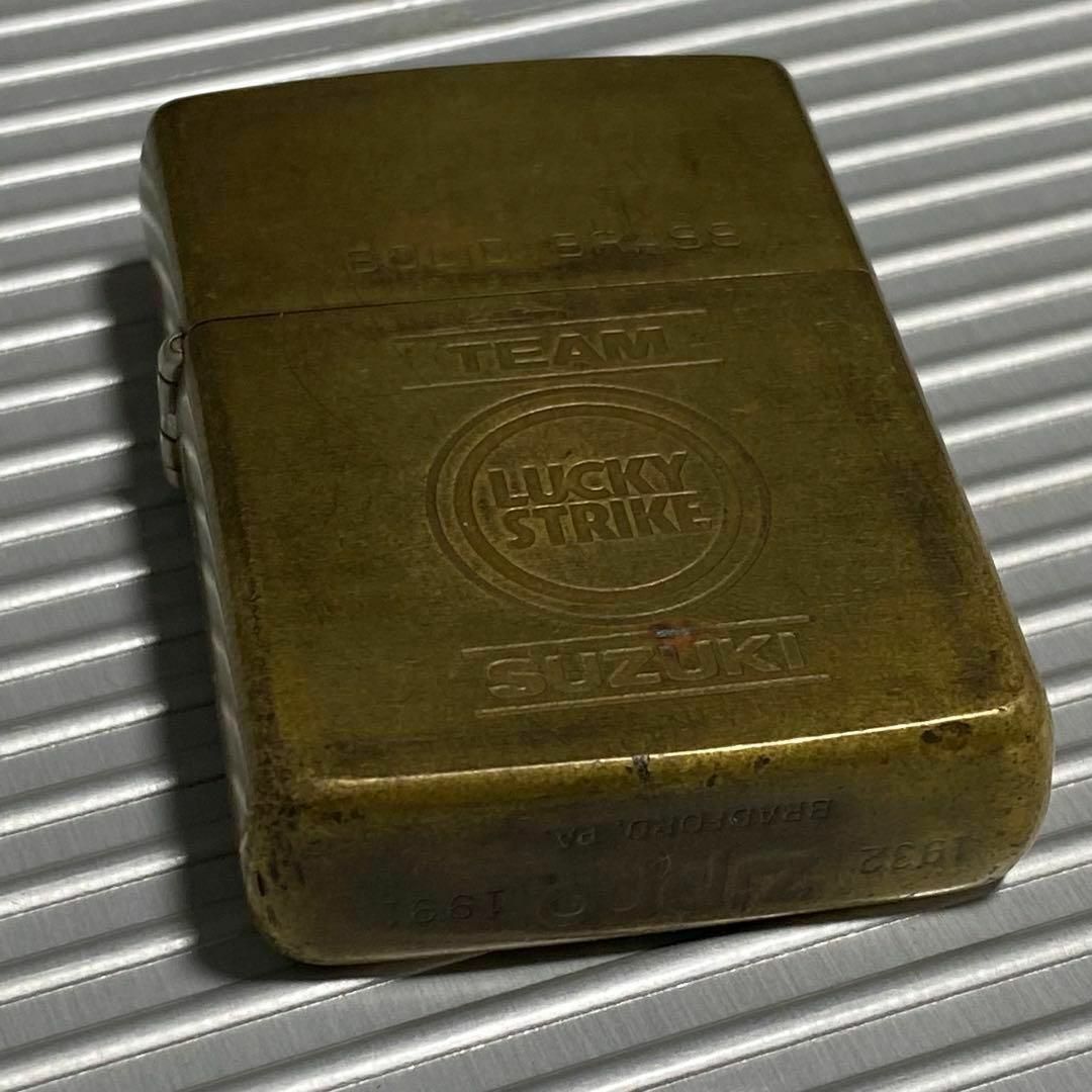 ZIPPO(ジッポー)の【希少】Zippo 1991年製 ラッキーストライク TEAM SUZUKI インテリア/住まい/日用品のインテリア小物(その他)の商品写真