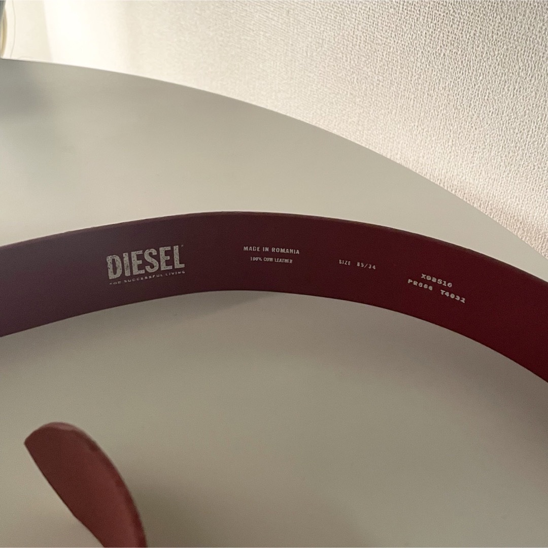 DIESEL(ディーゼル)の【DIESEL】dロゴ メタルロゴ カウレザー  ベルト レッド レディースのファッション小物(ベルト)の商品写真