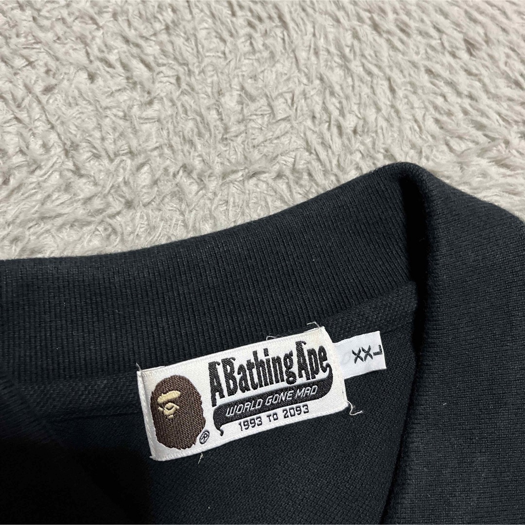 A BATHING APE(アベイシングエイプ)のAPE BAPE KAWS ONE PIECE ワンピース　tシャツ　ポロシャツ メンズのトップス(ポロシャツ)の商品写真