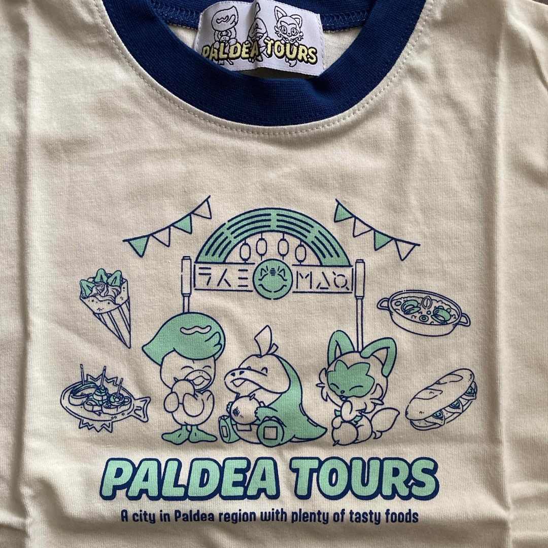 ポケモン(ポケモン)の【新品】PALDEA TOURS♡チャンプルタウン♡半袖Tシャツ♡110サイズ キッズ/ベビー/マタニティのキッズ服男の子用(90cm~)(Tシャツ/カットソー)の商品写真