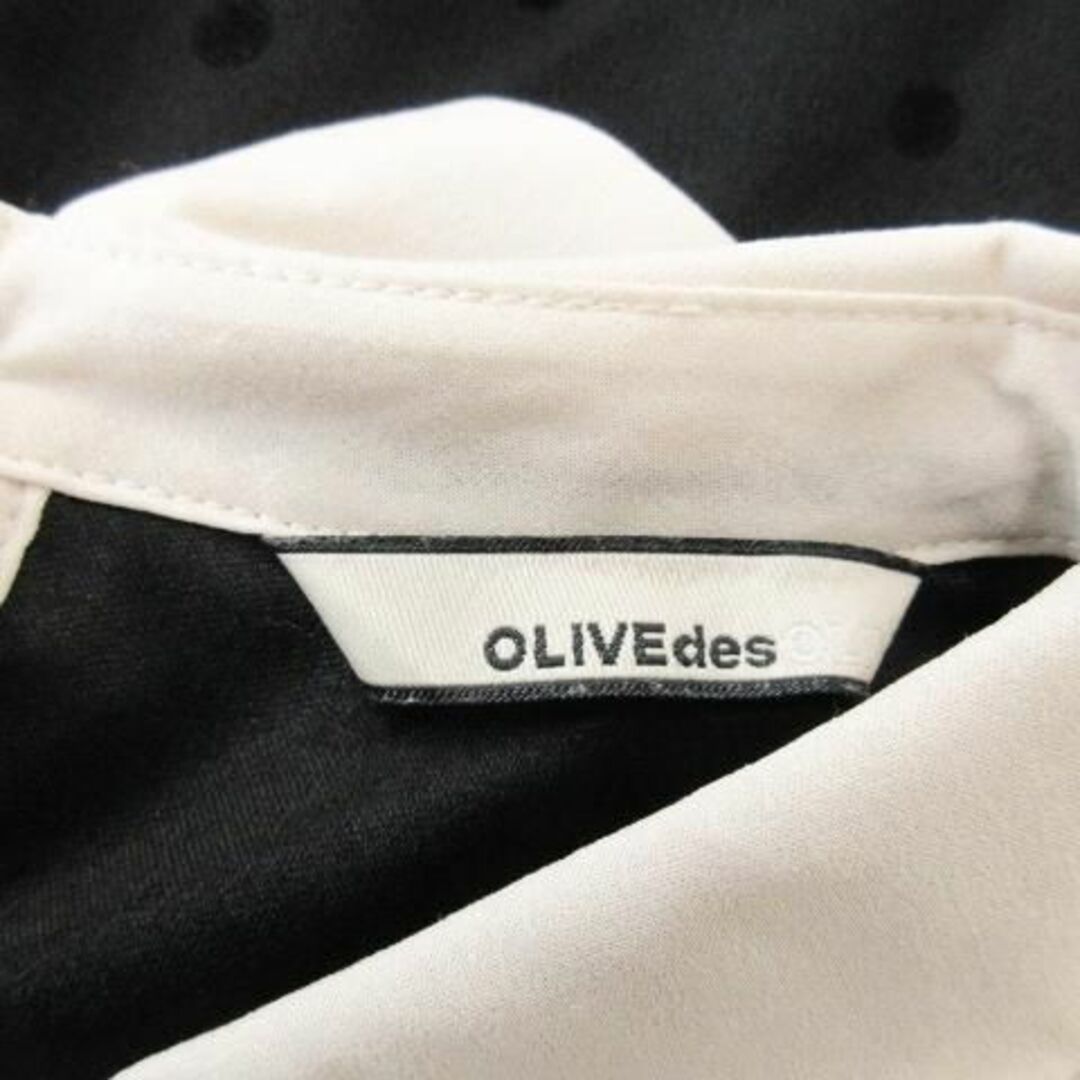 OLIVEdesOLIVE(オリーブデオリーブ)のオリーブデオリーブ ダブルカラードットミニワンピース 黒 230731CK1A レディースのワンピース(ミニワンピース)の商品写真