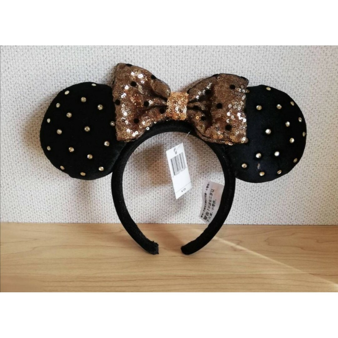 Disney(ディズニー)のho ディズニーカチューシャ　スパンコール　　水玉　黒　ミニー レディースのヘアアクセサリー(カチューシャ)の商品写真