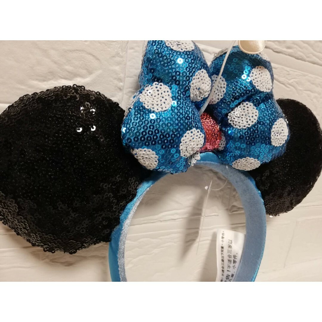 Disney(ディズニー)のmg ディズニー　カチューシャ　水色 クラシック水玉　ミニー　イースター レディースのヘアアクセサリー(カチューシャ)の商品写真