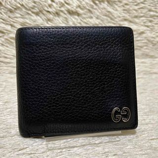グッチ(Gucci)の709 GUCCI グッチ 二つ折り財布 ドリアン GGメタル レザー ブラック(折り財布)