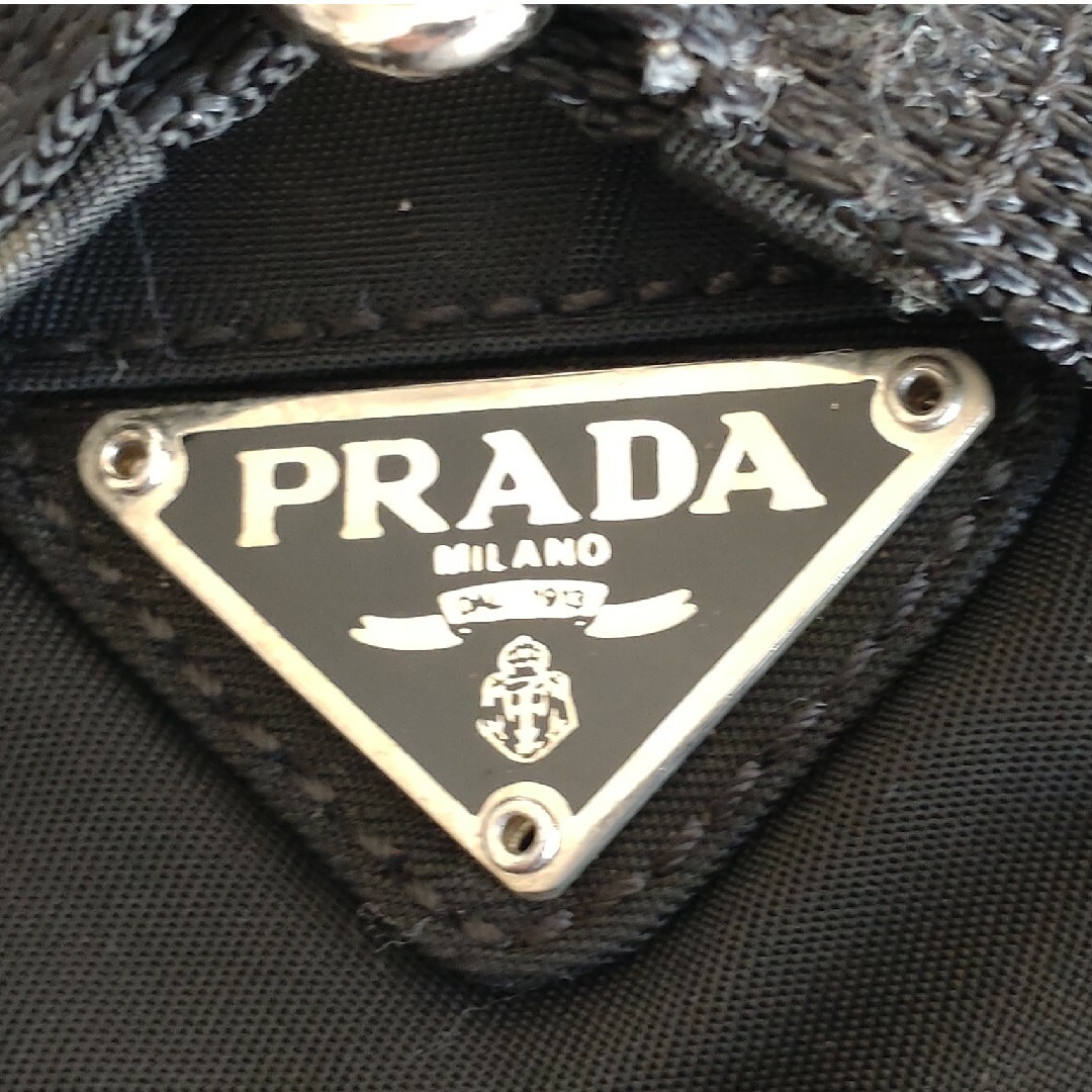 PRADA(プラダ)の【プラダ】匿名配送 PRADA ミニリュック ブラック 三角ロゴ 白タグ レディースのバッグ(リュック/バックパック)の商品写真