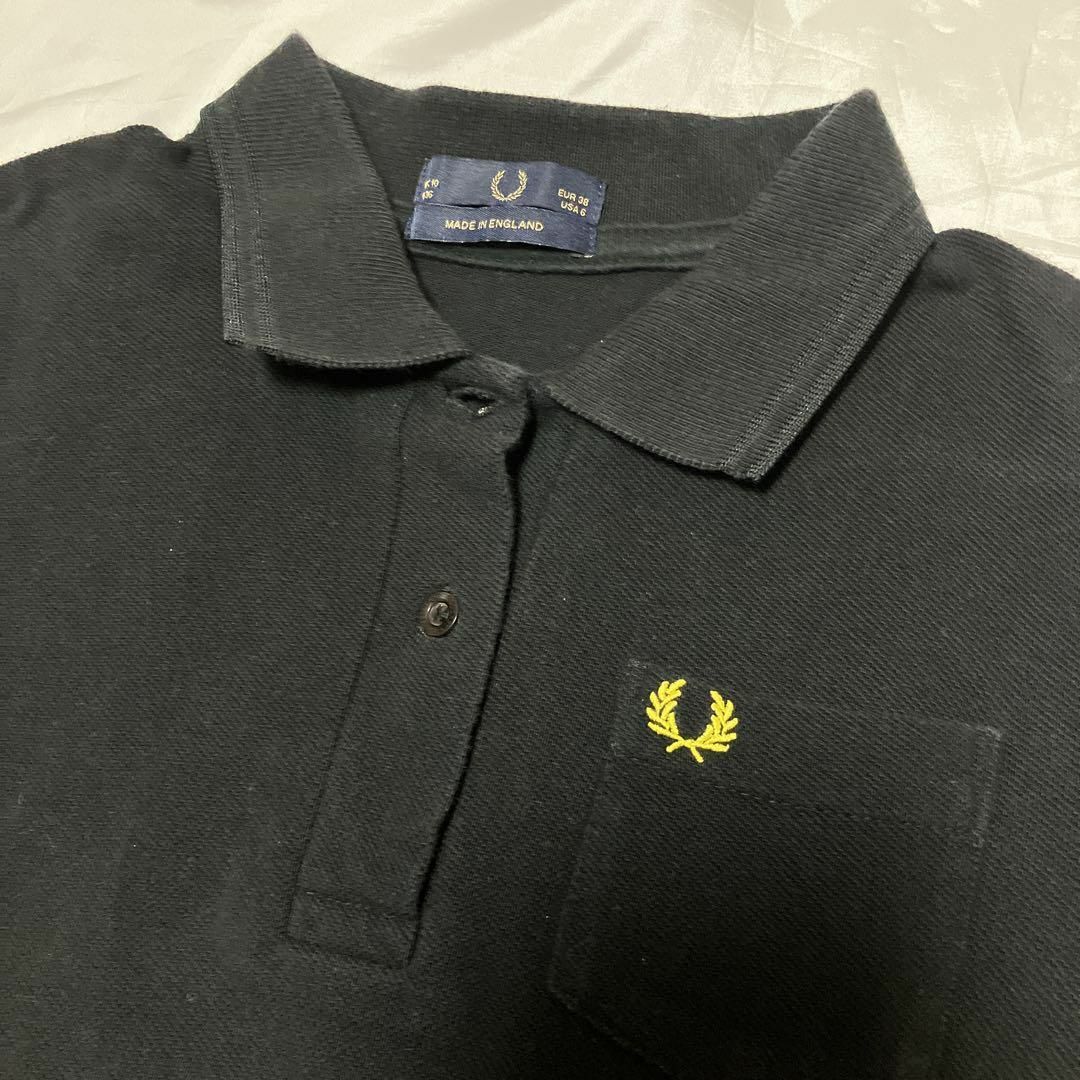 FRED PERRY(フレッドペリー)のFRED PERRY　ポロシャツ　イギリス製　ブラック　イエローレディース レディースのトップス(ポロシャツ)の商品写真