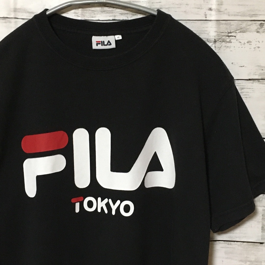 FILA(フィラ)の【人気】フィラ FILA Tシャツ カットソー M 黒 ロゴT 古着 メンズのトップス(Tシャツ/カットソー(半袖/袖なし))の商品写真