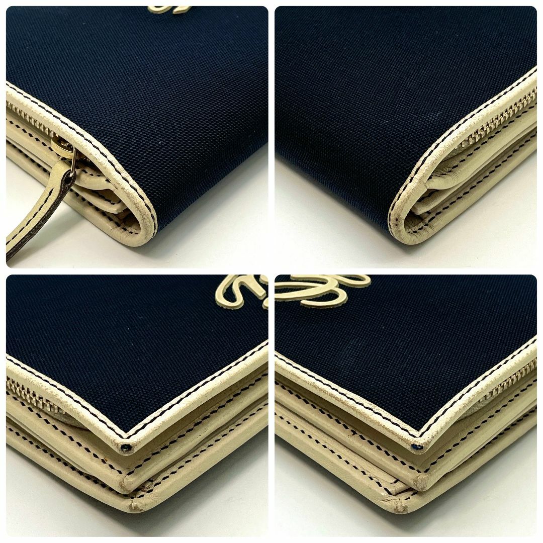 Gucci(グッチ)のGUCCI キャンバスxレザー ロゴ 二つ折り長財布 ネイビー x アイボリー レディースのファッション小物(財布)の商品写真