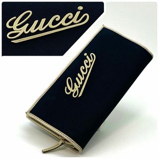 グッチ(Gucci)のGUCCI キャンバスxレザー ロゴ 二つ折り長財布 ネイビー x アイボリー(財布)