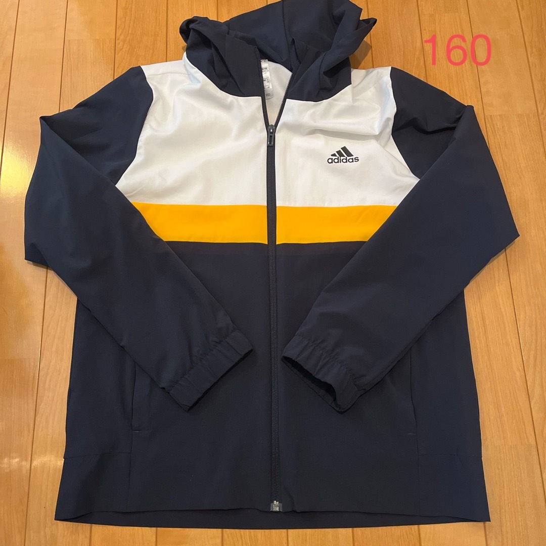 adidas(アディダス)のキッズ　ボーイズ　ジャンパー　160 紺×白×黄　アディダス キッズ/ベビー/マタニティのキッズ服男の子用(90cm~)(ジャケット/上着)の商品写真