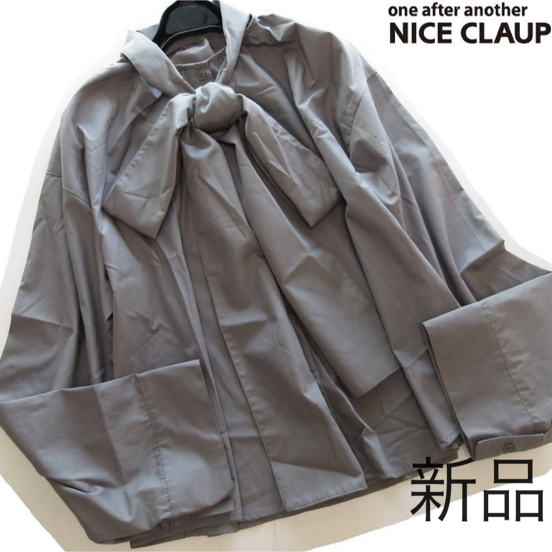 NICE CLAUP(ナイスクラップ)の新品NICE CLAUP ビッグリボンワイドスリーブゆるブラウス/GR レディースのトップス(シャツ/ブラウス(長袖/七分))の商品写真