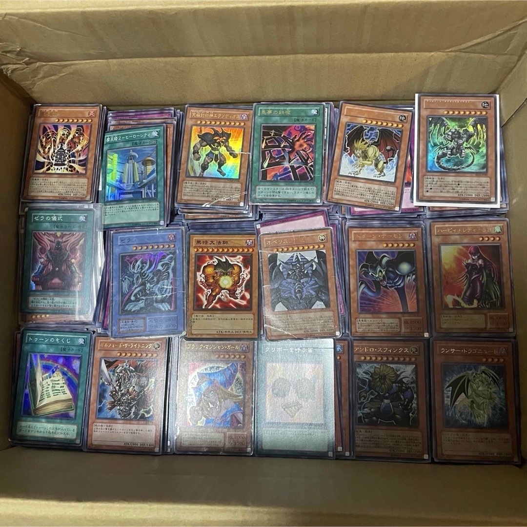 遊戯王(ユウギオウ)の【遊戯王】引退品　一万枚　まとめ売り　オマケ付き エンタメ/ホビーのアニメグッズ(カード)の商品写真