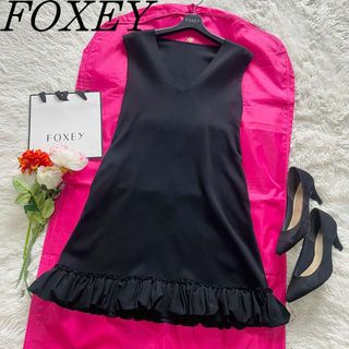 フォクシーニューヨーク(FOXEY NEW YORK)の【美品】FOXEY NEW YORK サマーニットワンピース ブラック 40(ひざ丈ワンピース)