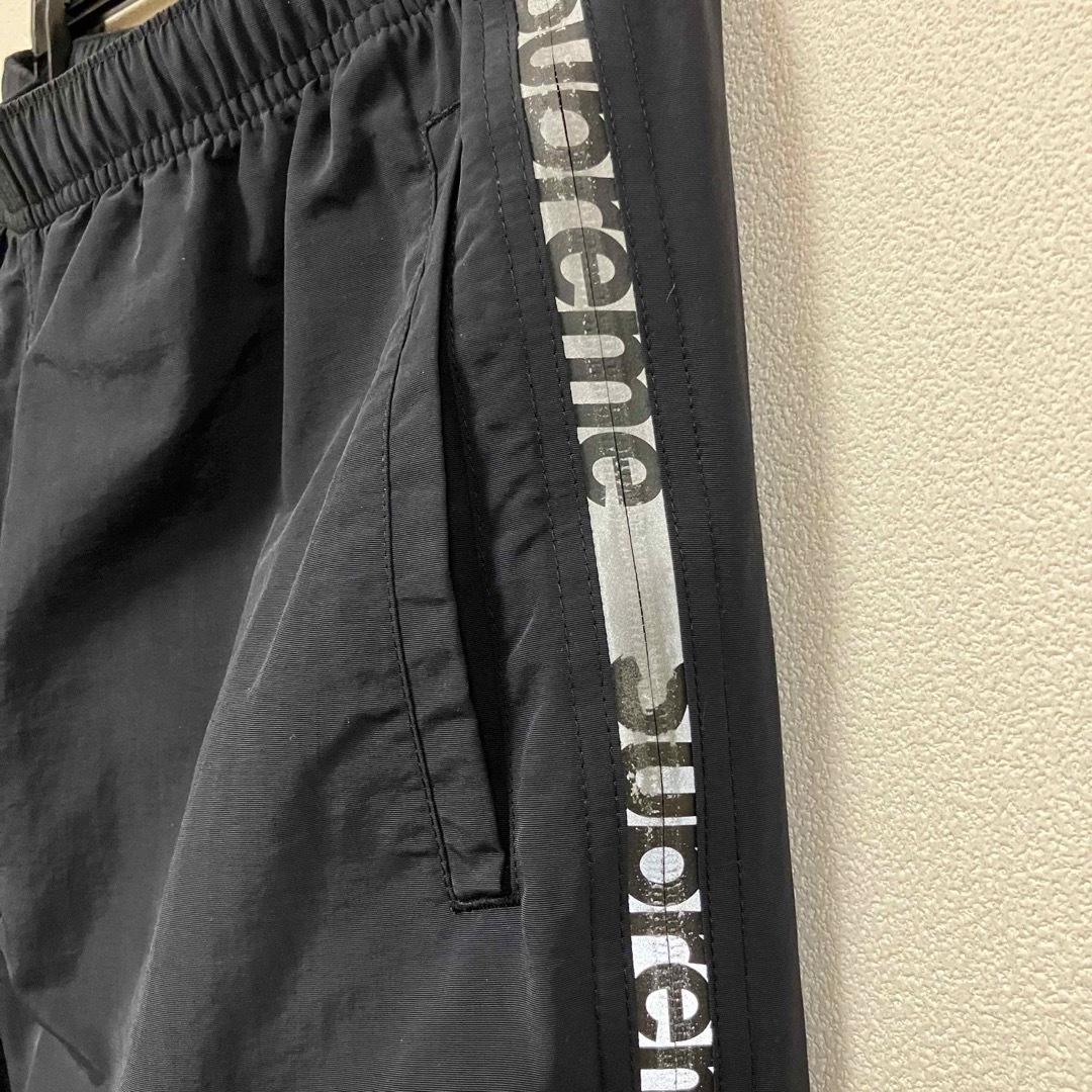 Supreme(シュプリーム)の込★Supreme Reflective Zip Track Pant★黒S メンズのパンツ(その他)の商品写真