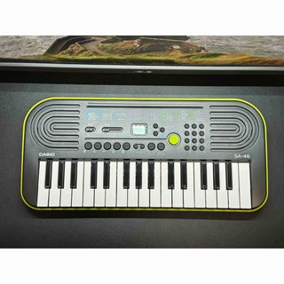 カシオ(CASIO)のカシオ 電子ミニキーボード 32ミニ鍵盤 SA-46 ブラック&グリーン(キーボード/シンセサイザー)