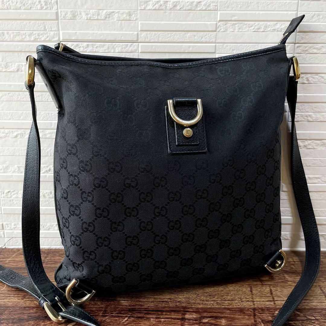 Gucci(グッチ)のグッチ キャンバス×レザー GG ショルダー バッグ ゴールド金具 ブラック メンズのバッグ(ショルダーバッグ)の商品写真