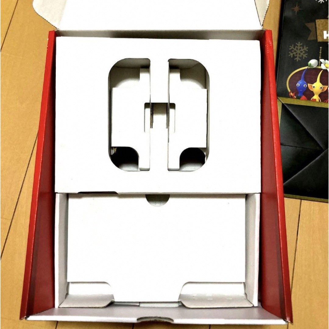 Nintendo Switch(ニンテンドースイッチ)のSwitch 任天堂　空き箱　保管用　マリオレッド　限定マリオショッパー エンタメ/ホビーのゲームソフト/ゲーム機本体(その他)の商品写真