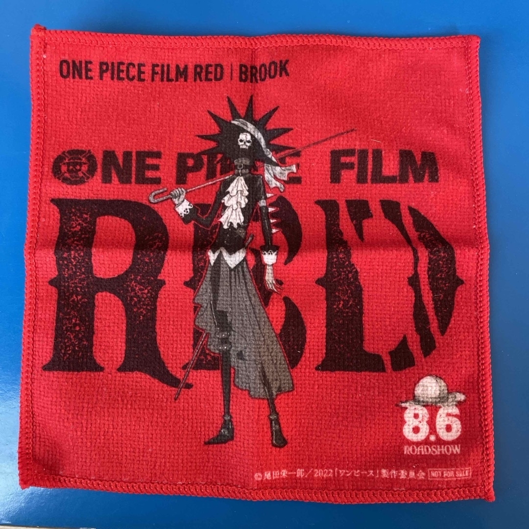 ONE PIECE(ワンピース)の【お値下げ】【非売品】ワンビースフィルム ハンドタオルとノート エンタメ/ホビーのおもちゃ/ぬいぐるみ(キャラクターグッズ)の商品写真