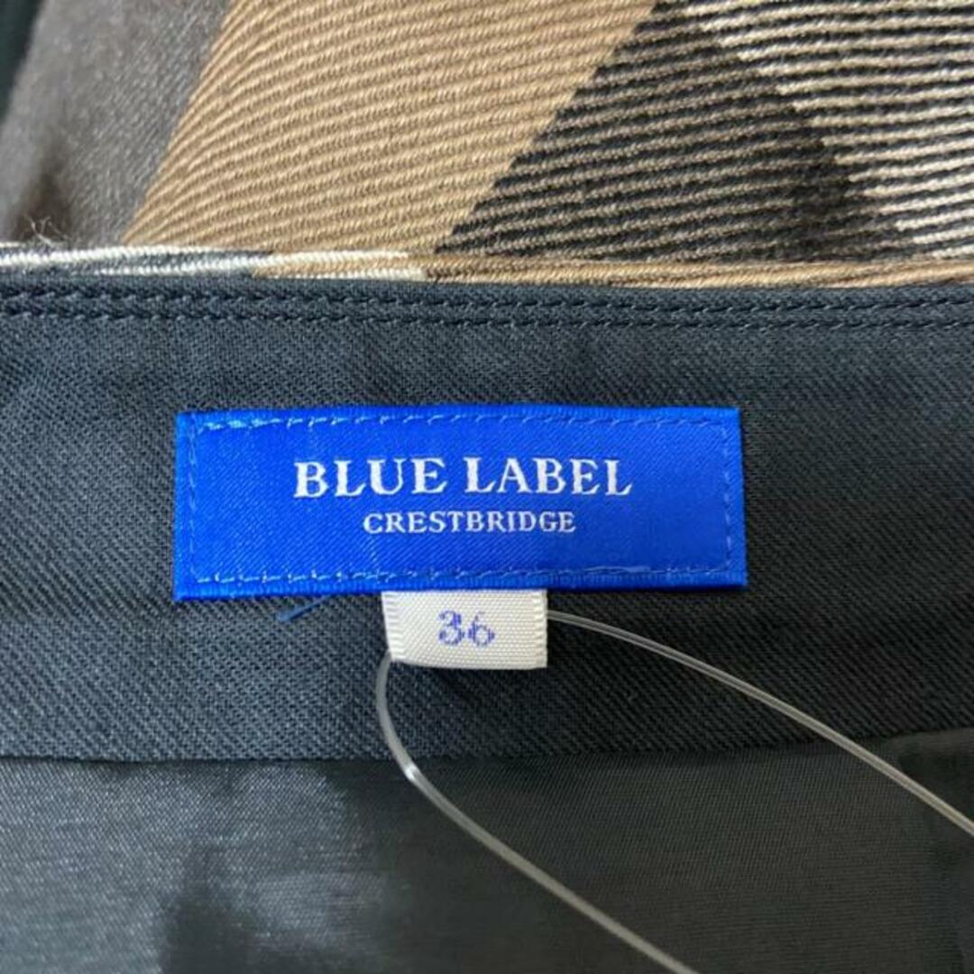 BLUE LABEL CRESTBRIDGE(ブルーレーベルクレストブリッジ)のBLUE LABEL CRESTBRIDGE(ブルーレーベルクレストブリッジ) スカート サイズ36 S レディース - ベージュ×黒×マルチ ひざ丈/チェック柄 レディースのスカート(その他)の商品写真