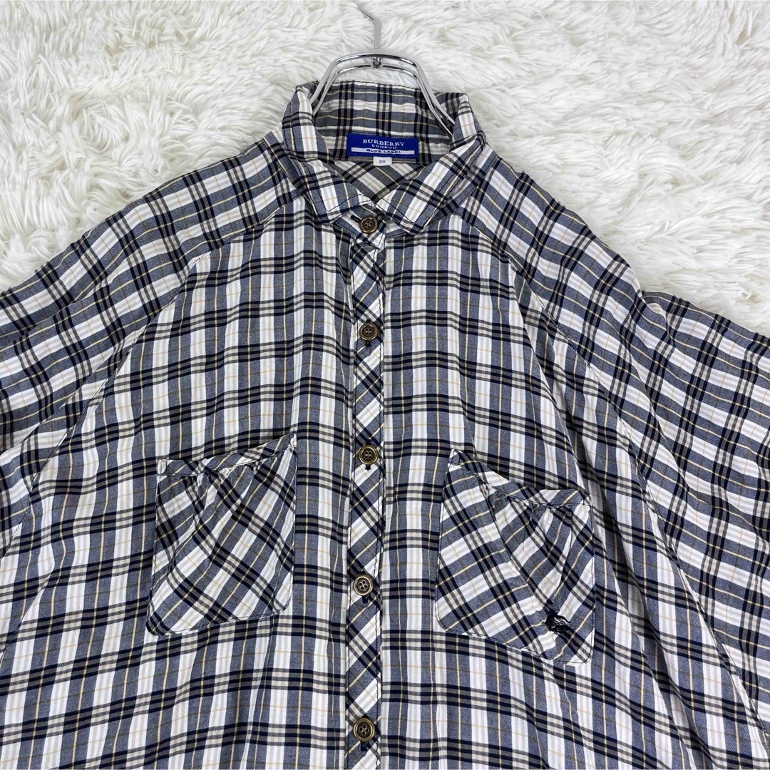 BURBERRY BLUE LABEL(バーバリーブルーレーベル)のBurberry バーバリー　チェックシャツ　ボレロ チェック柄ドルマンスリーブ レディースのトップス(その他)の商品写真