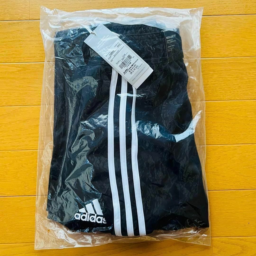 adidas(アディダス)のアディダス　スリムテーパード　スリーストライプス パンツ　メンズ　 黒　 L メンズのパンツ(その他)の商品写真