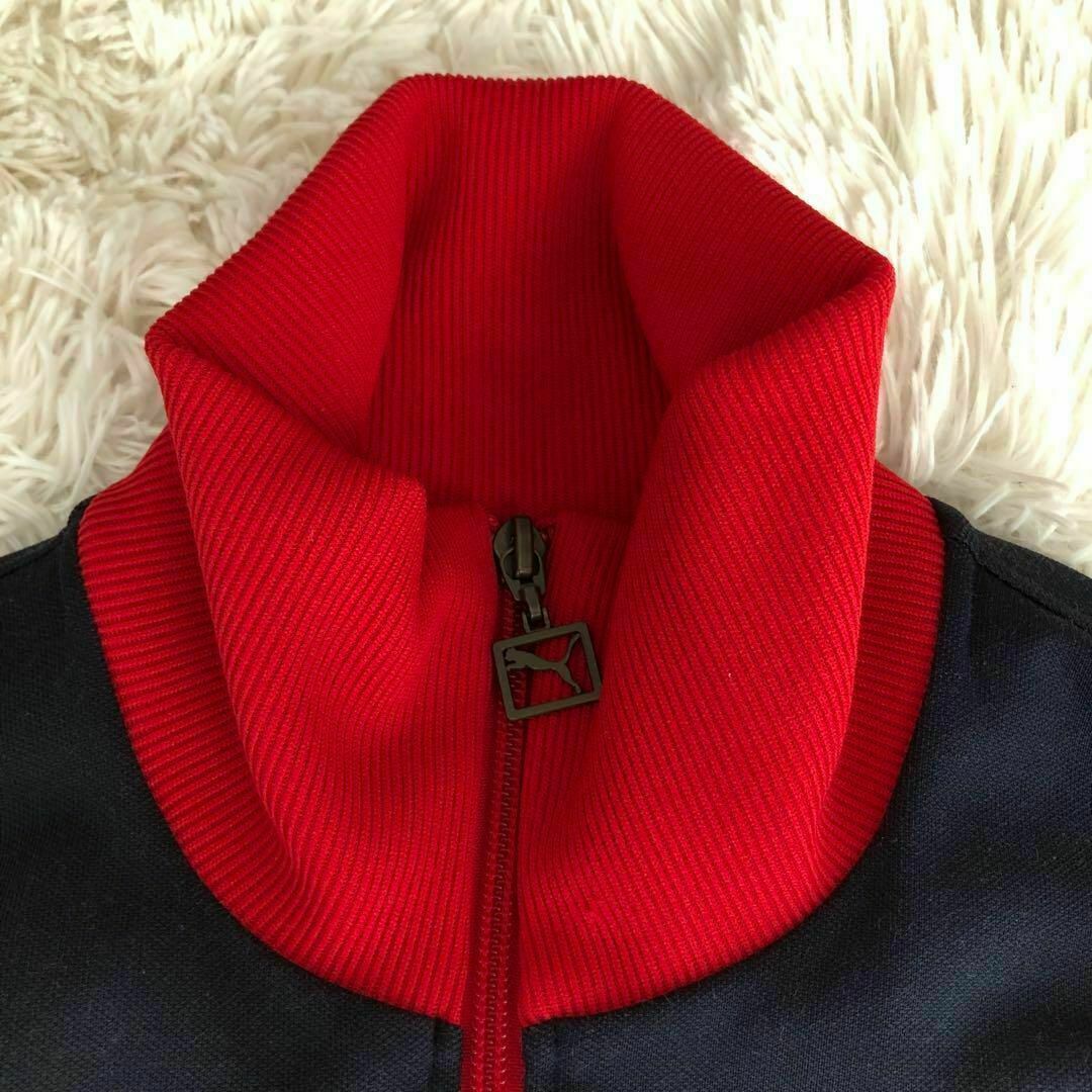PUMA(プーマ)のPUMAプーマトラックジャケットネイビー×赤　イングランド代表ジャージ古着 レディースのトップス(その他)の商品写真