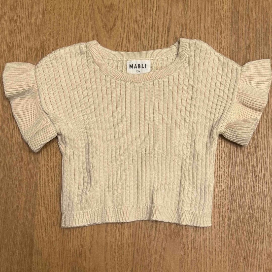 こどもビームス(コドモビームス)のmabli ニットフリルトップス　12m キッズ/ベビー/マタニティのベビー服(~85cm)(シャツ/カットソー)の商品写真